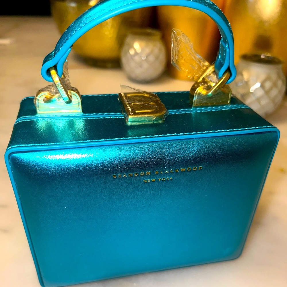 Brand New Brandon Blackwood Metallic Mini Kendrick Trunk with Goldhardware.